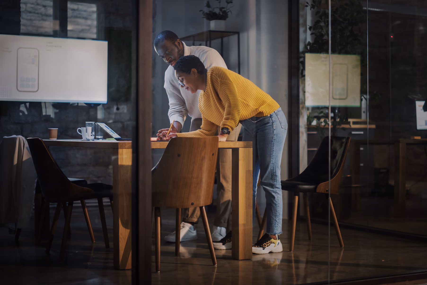 Man and woman working on a project